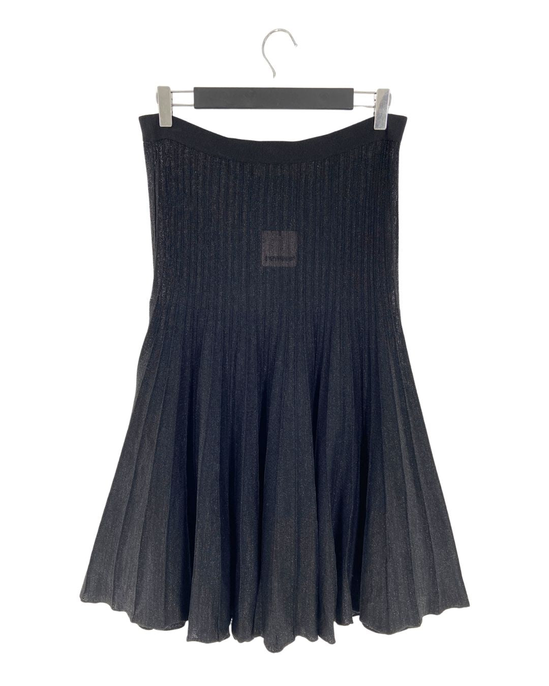 Falda midi traslucida