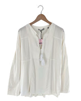 Blusa manga larga anudada