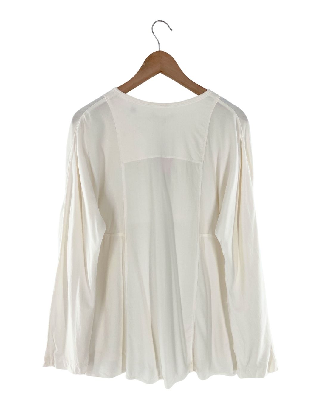 Blusa manga larga anudada