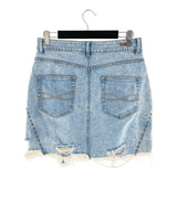 Falda mini con taches