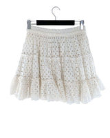 Falda mini en ojalillo