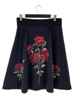 Falda midi amplia print flores