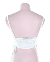 Crop top anudado en laterales
