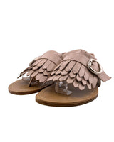 Sandalias planas en cuero