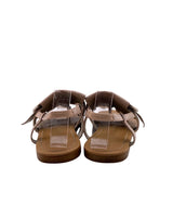 Sandalias planas en cuero