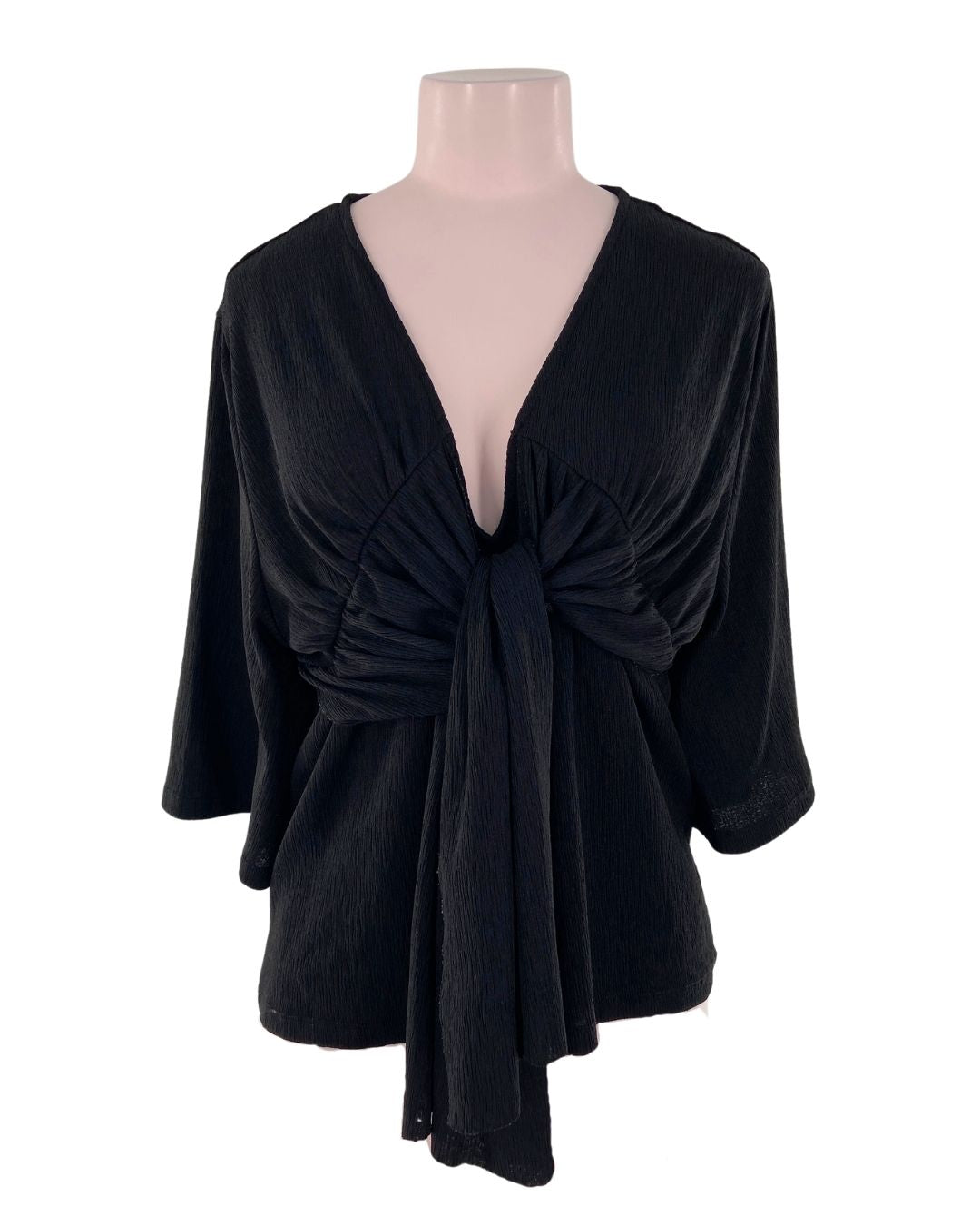 Blusa manga 3/4 con textura
