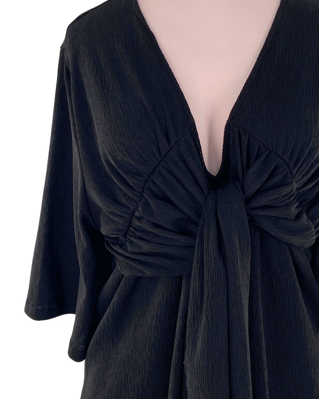 Blusa manga 3/4 con textura