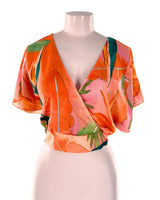 Blusa anudada en espalda