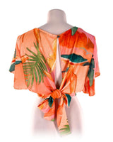 Blusa anudada en espalda