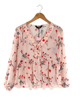 Blusa traslucida print flores