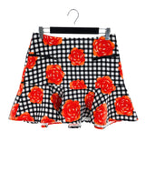 Falda mini con vuelo print