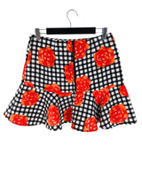 Falda mini con vuelo print