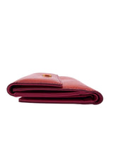 Billetera monogram en charol