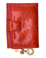 Billetera monogram en charol