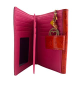 Billetera monogram en charol