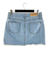 Falda mini en denim destroyed
