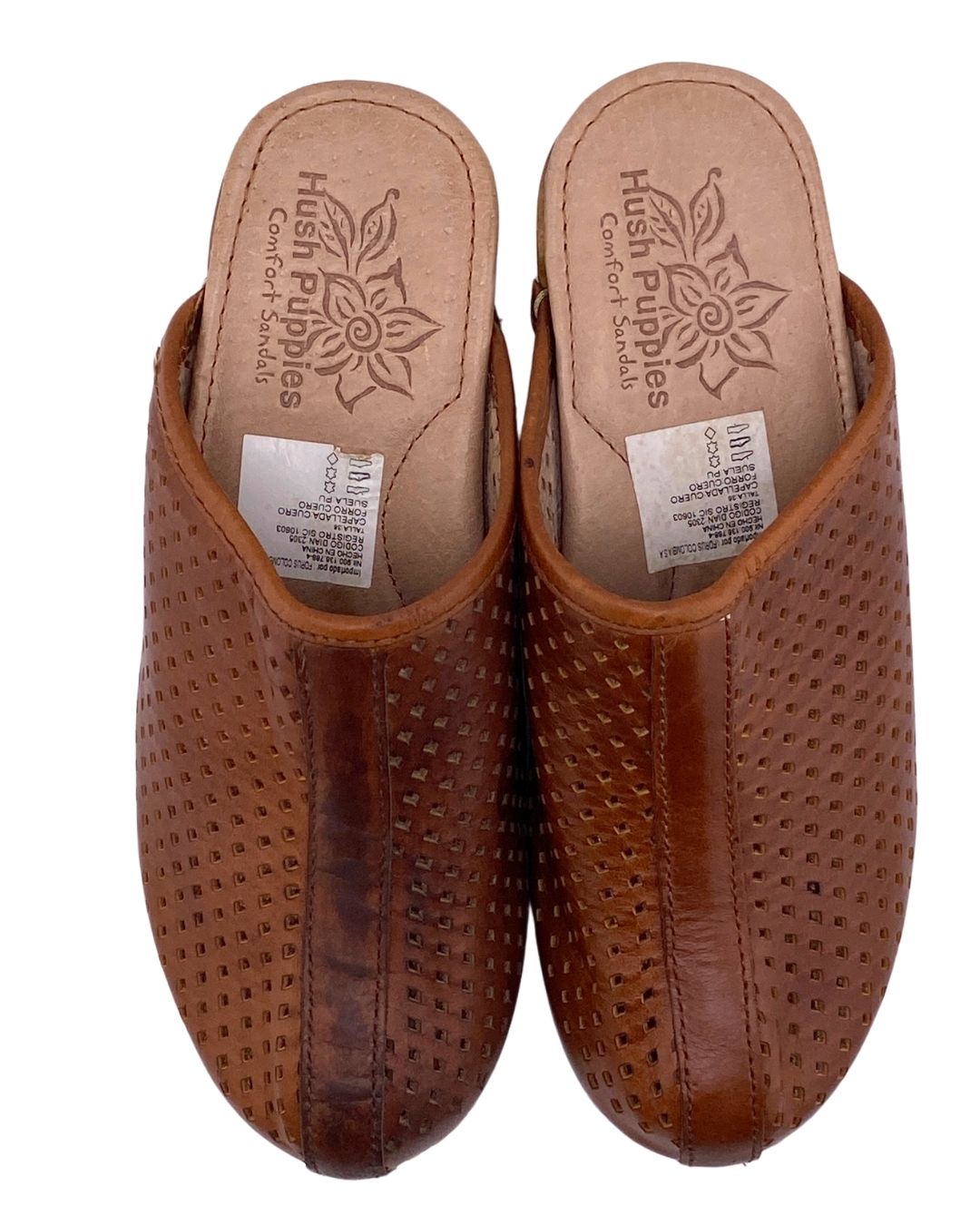 Zuecos en madera y cuero