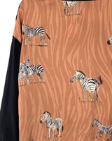 Blusa satinada en delantero