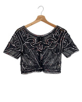 Blusa en mesh con recamado
