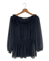 Blusa mangas traslucidas