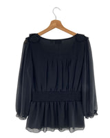 Blusa mangas traslucidas