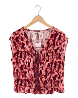 Blusa anudada en delantero