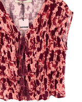 Blusa anudada en delantero