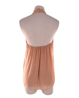 Blusa al cuello con anudado