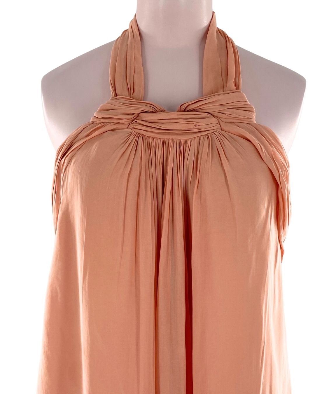 Blusa al cuello con anudado