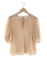 Blusa traslucida con textura