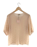 Blusa traslucida con textura