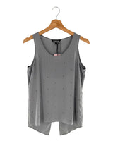 Blusa con taches brillantes
