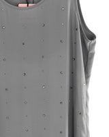 Blusa con taches brillantes