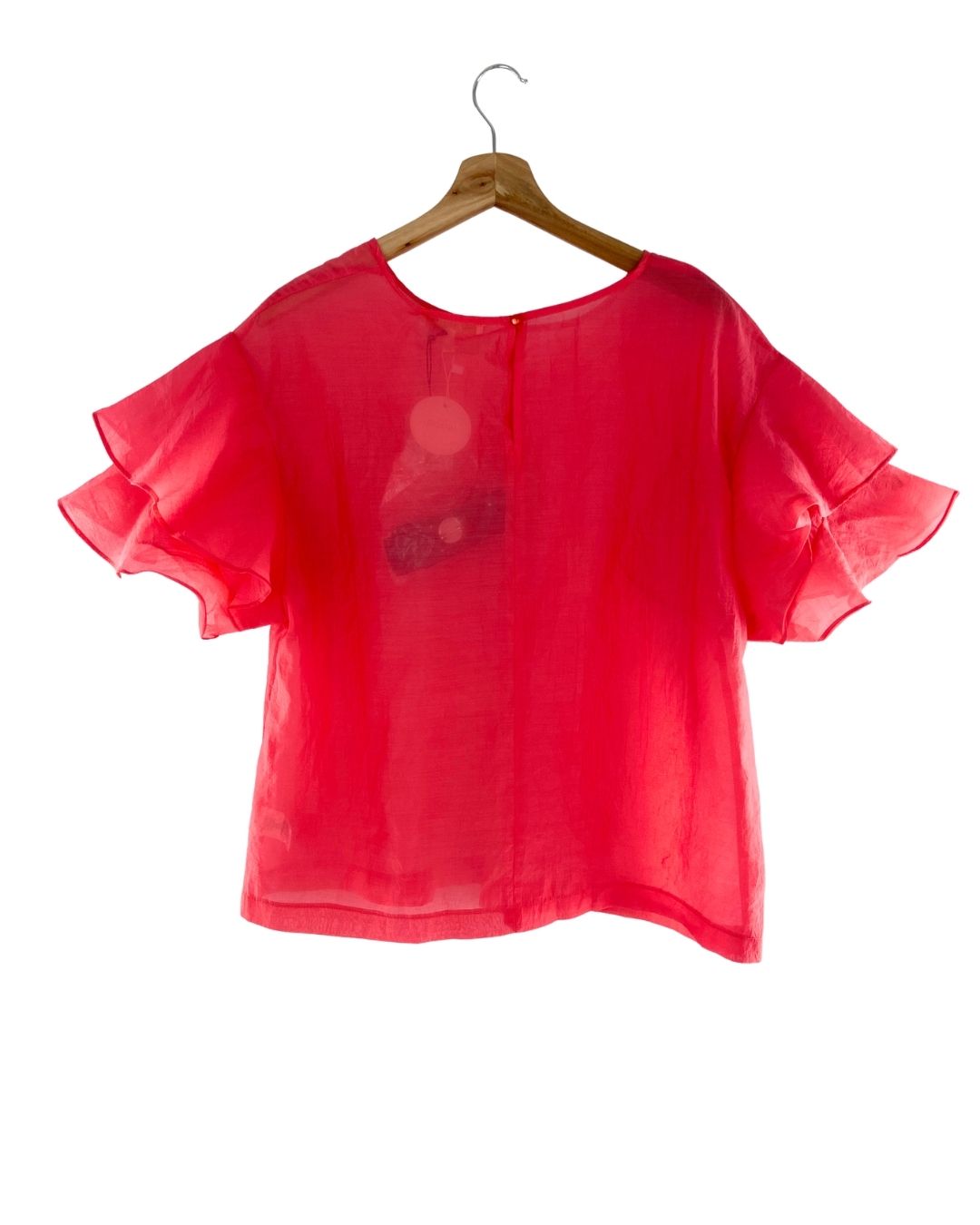 Blusa traslucida con lazo