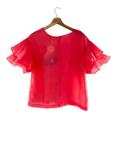 Blusa traslucida con lazo