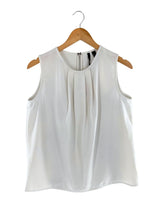 Blusa sleeveless con prenses