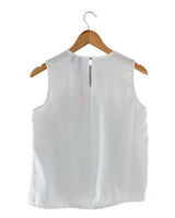 Blusa sleeveless con prenses