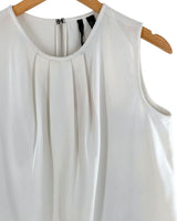 Blusa sleeveless con prenses