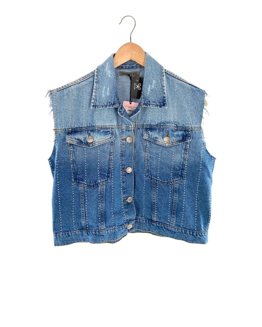 Chaleco en denim con taches