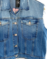Chaleco en denim con taches