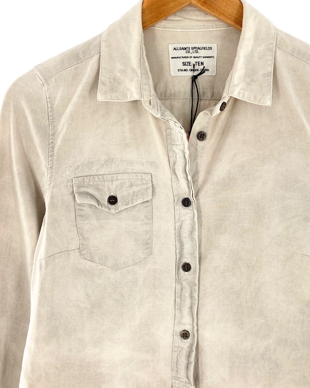 Camisa manga larga bolsillos