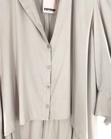 Blusa high and low cut out