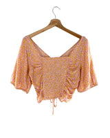 Blusa encauchada en espalda