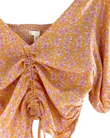 Blusa encauchada en espalda