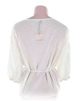 Blusa wrap en plumeti