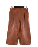 Pantalon capri rigido en cuero