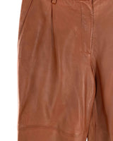 Pantalon capri rigido en cuero