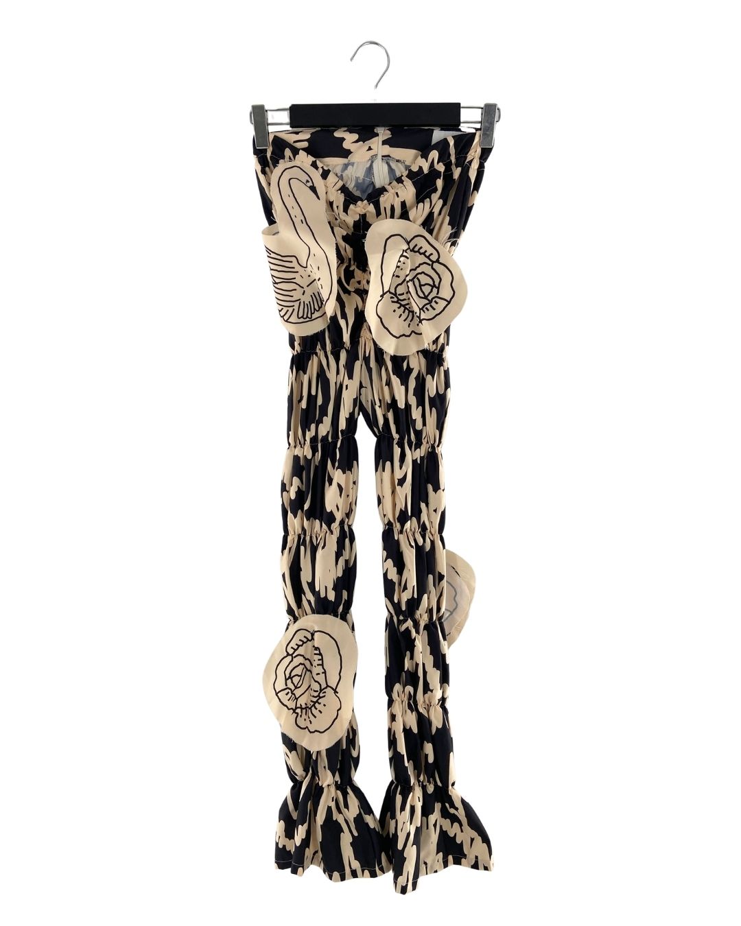 Pantalon encauchado print aves