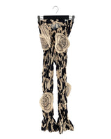 Pantalon encauchado print aves