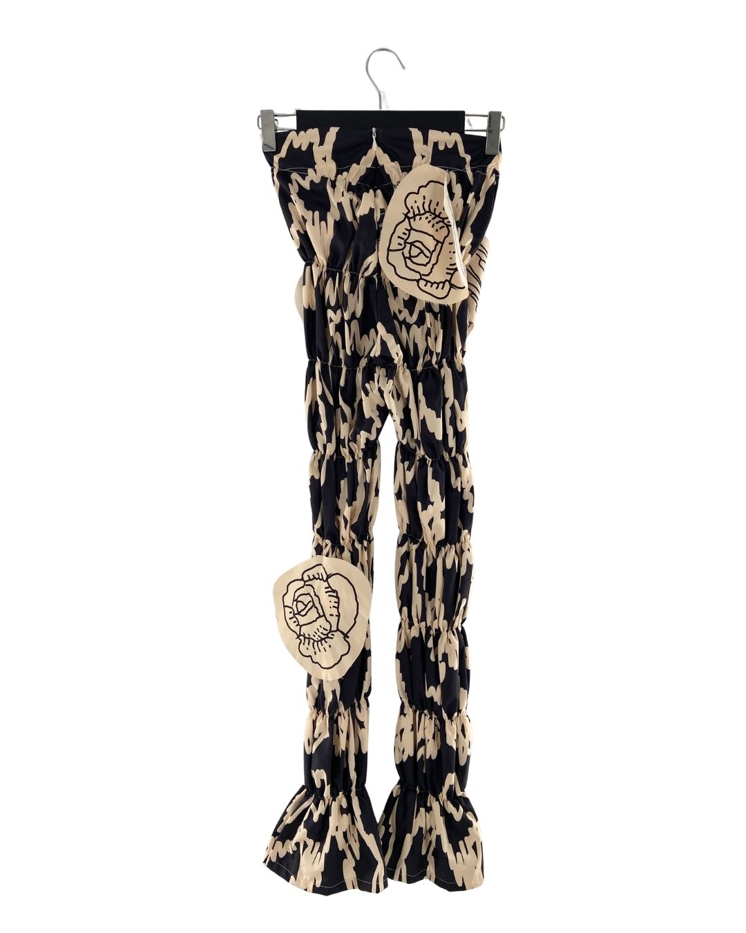 Pantalon encauchado print aves